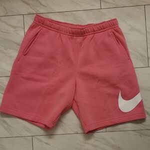Nike Vibrant Pink Shorts with Iconic White Swoosh